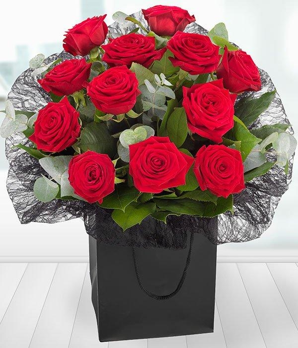 A luxury Dozen Red roses and chocolates