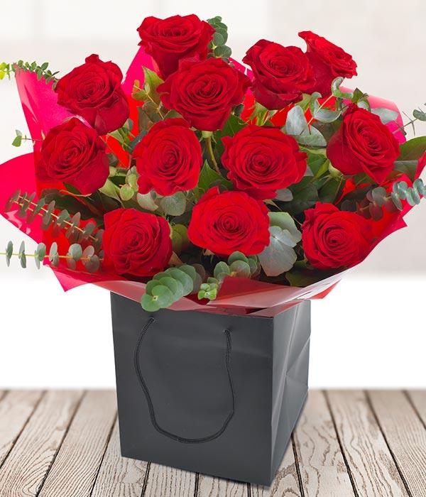 Dozen Red Roses with Luxury Foliage